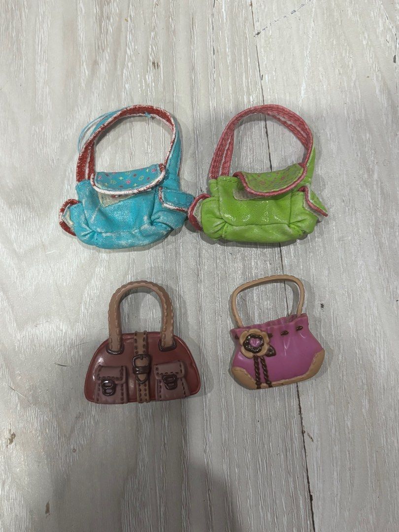 DOLL BAGS ( MYSCENE,BRATZ,ETC.) (Category: Kids Toys) located in Jaen. Submitted by petty_blue (Listing ID 1405383630, Image 2). Description: 👜 Pre-loved Doll Bags 💕 Can fit Mycene, Bratz, and other dolls ✨ Good condition & perfect for display or play 💸 Price: ₱70 each 🚚 Shipping: J&T only 🧾 Payment Methods: GCASH or Bank Transfer Only 📌 Payment First Policy ❌ No cancellations once order is confirmed .