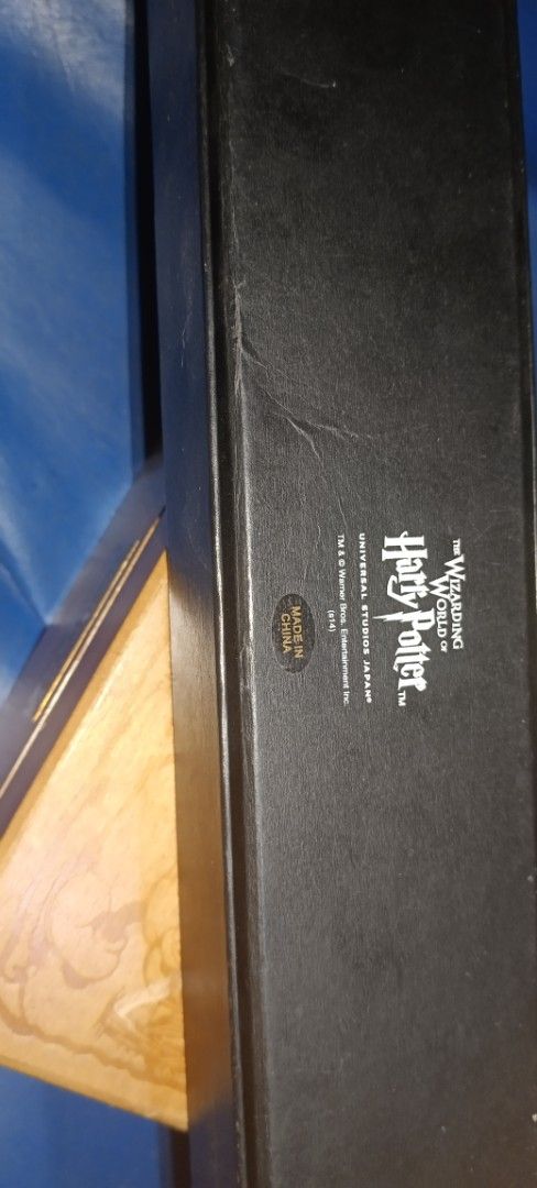 Harry Potter Wand with Box (Category: Western Merchandise) located in Batangas. Submitted by baning_finds (Listing ID 1405521977, Image 3). Description: - Authentic Lord Voldemort wand - Includes original box - Unique wand design with light handle - Detailed, textured grip - Black box with Harry Potter logo - Made in China - Great collectible item with obvious sign of crack.