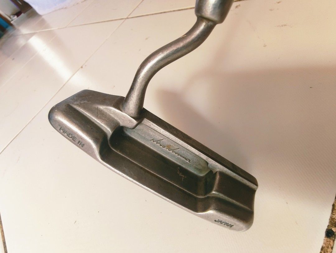 Honma Golf Putter (Category: Golf) located in Manila. Submitted by babz30261 (Listing ID 1405399457, Image 2). Description: - Honma golf putter - Made in Japan - Unique curved shaft design - Honma logo engraved on the putter head - Honma logo on the dark grip - Gold band detail on the shaft.