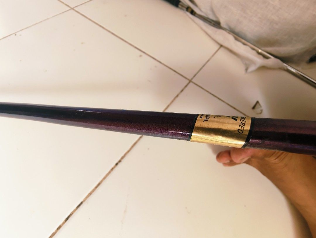 Honma Golf Putter (Category: Golf) located in Manila. Submitted by babz30261 (Listing ID 1405399457, Image 3). Description: - Honma golf putter - Made in Japan - Unique curved shaft design - Honma logo engraved on the putter head - Honma logo on the dark grip - Gold band detail on the shaft.