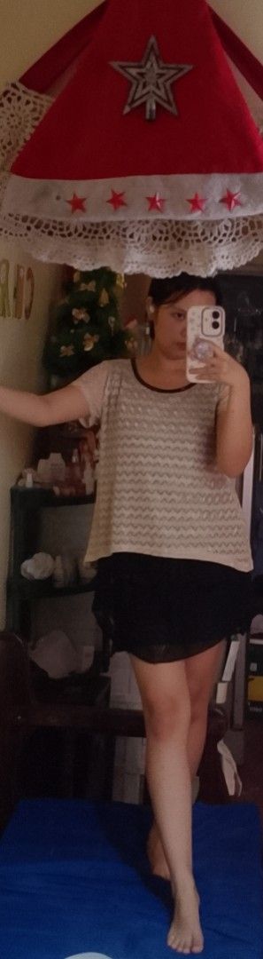 Lace Top (Category: Shirts) located in Marikina City. Submitted by lemonpreluvs (Listing ID 1405444462, Image 1). Description: - Cream-colored lace top with black trim - Top features short sleeves and a slightly loose fit - Delicate lace fabric - Ideal for a casual and stylish outfit lace blouse but can be a mini dress if partnered with black skirt like I did on the photo size is small or medium actual dimensions length- 78 cm width- 44 cm.