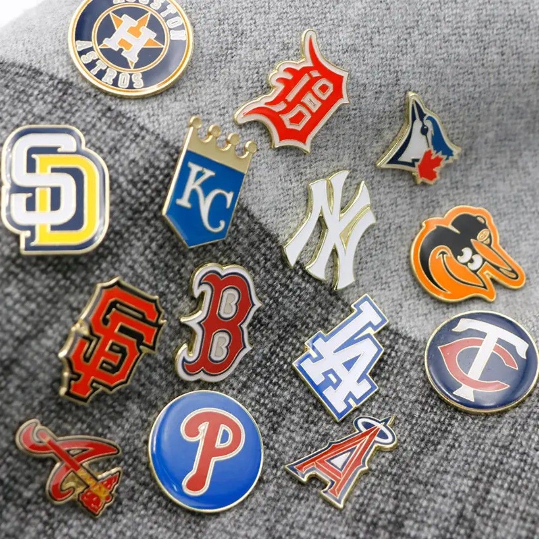 MLB Baseball Team Pins (Category: Vintage Collectibles) located in Las Pinas. Submitted by eFF01 (Listing ID 1405507030, Image 3). Description: Collection of MLB baseball team pins. Features various team logos including the San Francisco Giants, Chicago Cubs, New York Yankees, Los Angeles Dodgers, and more. Each pin has a gold-colored border. Perfect for baseball fans and collectors. Great for jackets, bags, or displaying..