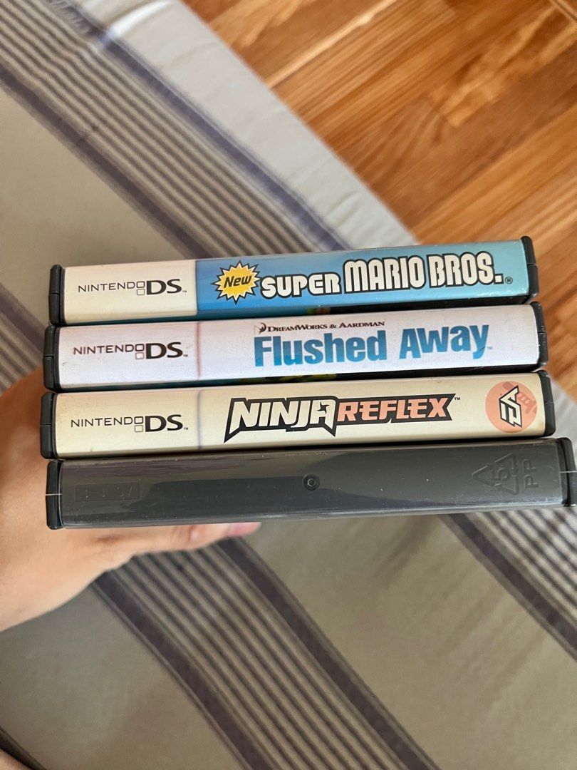 Nintendo DS Games (Category: Nintendo) located in Manila. Submitted by patricklabadia24 (Listing ID 1405407507, Image 1). Description: Super Mario Bros - 800 Flushed Away (Replacement Cover) - 400 Ninja Reflex - 300 Blank DS Game Case - 200.