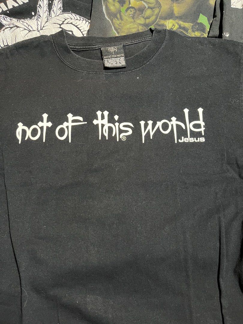 Not of This World Jesus T-shirt (Category: Tshirts & Polo Shirts ) located in Valenzuela. Submitted by 94thrift (Listing ID 1405489708, Image 1). Description: Not of this World - Jesus •Width: 20 •Length: 28.5 •Pinhole ₱880 + shipping fee MOP: Gcash Courier: J&T, LBC and Lalamove 📍Loc: Valenzuela City.