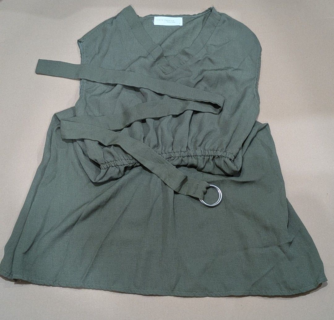 Olive Green Dress with Belt (Category: Dresses) located in Manila. Submitted by dochju (Listing ID 1405509664, Image 1). Description: PM your offers Olive green V-neck dress. Features a cinched waist with belt and silver ring detail. Relaxed, flowing fit. Lightweight fabric..