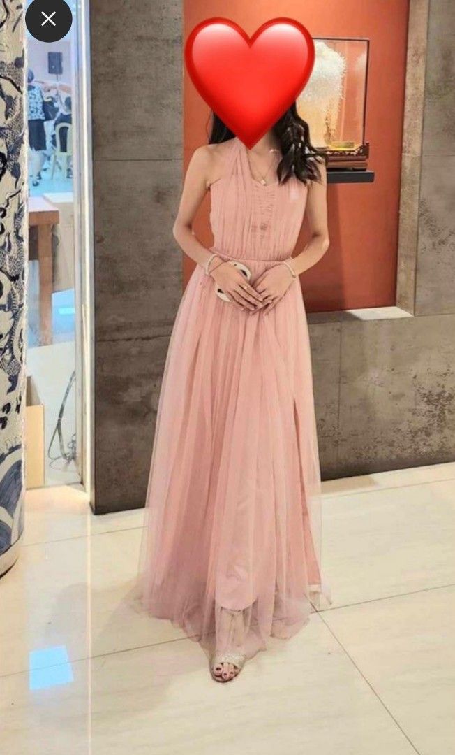 Pink Tulle Bridesmaid Gown (Category: Evening dresses & gowns) located in Iloilo. Submitted by lissuin (Listing ID 1405460669, Image 1). Description: Pink tulle bridesmaid gown/dress Can be worn in 4 ways (as shown in the pictures) With padding With slit Measurements: Bust - 31 Waist - 25 Hip length - 50 Altered to fit narrower bust but the stitching can be removed to return it to its original size. Minor flaw: Has a slight rip at the hem of dres
