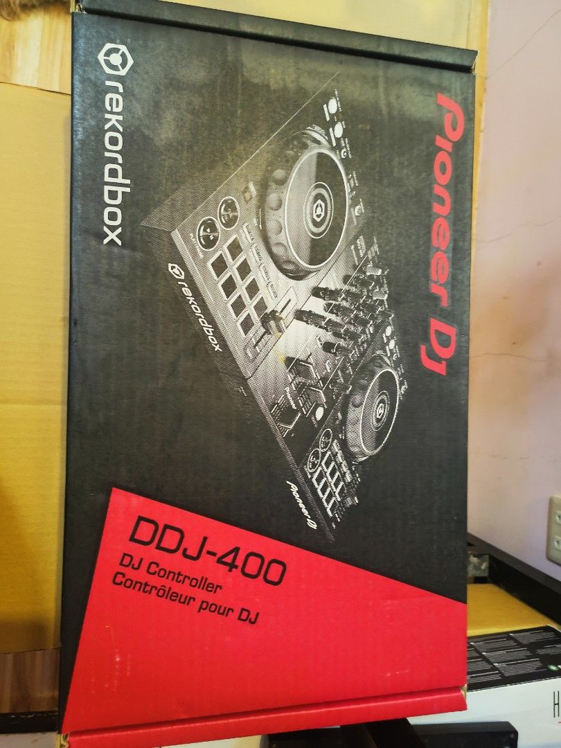 Pioneer DJ DDJ-400 DJ Controller (Category: Other Audio Equipment) located in Bustos. Submitted by jesstoms20 (Listing ID 1405348084, Image 1). Description: - Pioneer DJ DDJ-400 DJ controller - Designed for rekordbox DJ software - Includes original box - Comes in original packaging - Box features black with red accents - Controller is visible in the box.