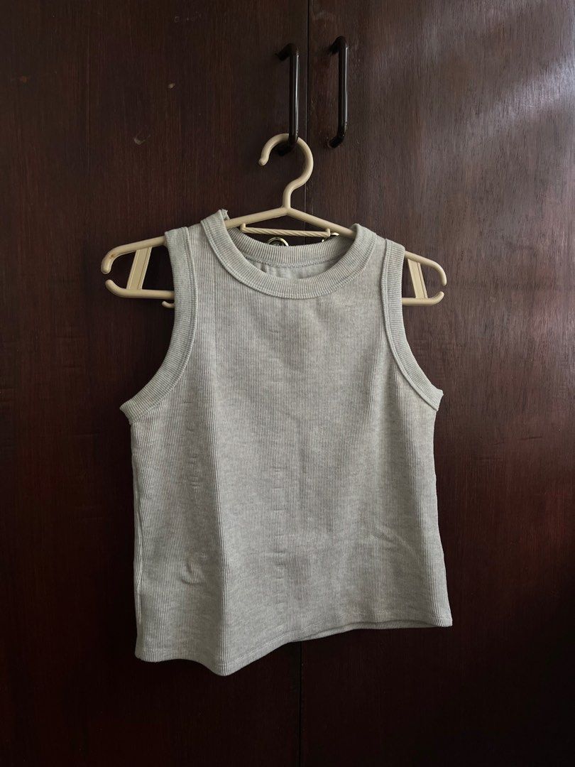 Ribbed Tank Top - Black, Gray, Navy (Category: Sleeveless) located in Muntinlupa City. Submitted by dkimch (Listing ID 1405387848, Image 2). Description: - Set of 3 ribbed tank tops: black, gray, and navy - Round neckline - Sleeveless design - Made from soft, comfortable material - Perfect for everyday wear No brand - Easy to pair with different bottoms - Fits S-M 200 all three 80/piece.