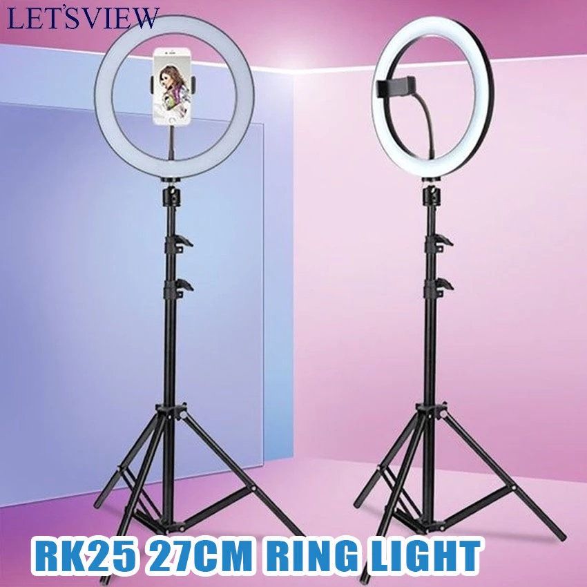 RK25 27cm Ring Light with Tripod (Category: Lighting & Studio Equipment) located in Caloocan City. Submitted by ms.lily0120 (Listing ID 1405372298, Image 1). Description: - RK25 Ring Light - 27cm Diameter - Includes Adjustable Tripod Stand - Integrated Phone Holder - Great for Makeup Tutorials - Ideal for Live Streaming - Perfect for Video Calls use this link to order : https://invl.me/cln2zkd.