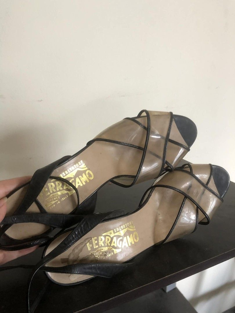 Salvatore Ferragamo Black Sandals (Category: Flats & Sandals) located in Quezon City. Submitted by puchi.cat (Listing ID 1405358100, Image 1). Description: - Salvatore Ferragamo sandals - Black color - Strappy design with clear overlay - Made in Italy - Salvatore Ferragamo logo on insole - Moderate heel height - UK 15 (small size) - NO BOX INCLUDED.
