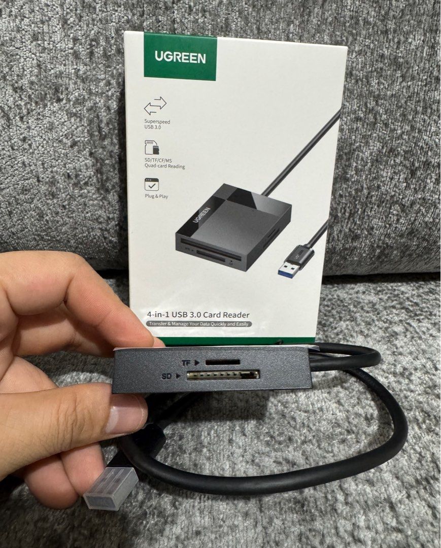 UGreen 4-IN-1 USB 3.0 Card Reader 5Gbps TRANSFER RATE (Black) (Category: Cables & Adaptors) located in Makati City. Submitted by jc.cuerdo (Listing ID 1405511978, Image 3). Description: Transfer More in Less Time Longer Cable Cord 1.7 ft cable provides more convenience and accessibility, making ports easier to reach. Instant Connection Plug and play for most operation systems, it works immediately once connecting to USB-A 3.0 port. 1146800 CR125 