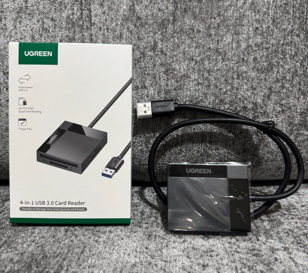 UGreen 4-IN-1 USB 3.0 Card Reader 5Gbps TRANSFER RATE (Black) (Category: Cables & Adaptors) located in Makati City. Submitted by jc.cuerdo (Listing ID 1405511978, Image 1). Description: Transfer More in Less Time Longer Cable Cord 1.7 ft cable provides more convenience and accessibility, making ports easier to reach. Instant Connection Plug and play for most operation systems, it works immediately once connecting to USB-A 3.0 port. 1146800 CR125 