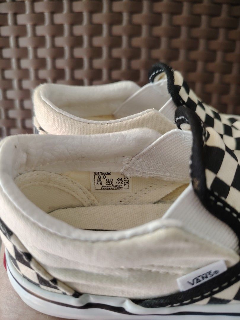 Vans Checkerboard Slip-On Toddler Shoes (Category: Babies & Kids Fashion) located in Baguio. Submitted by tyragailcollection2600 (Listing ID 1405419299, Image 2). Description: - Vans Checkerboard Slip-On toddler shoes - US size 8.0 -12cm - Iconic checkerboard pattern - Easy slip-on design - Features Vans logo - Some wear on soles.