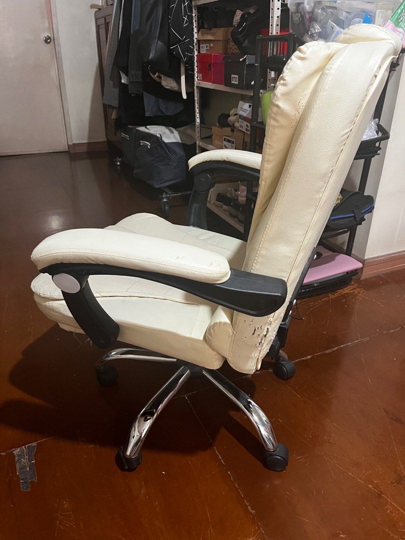 White Office Chair with Footrest (Category: Office Furniture & Fixtures) located in Quezon City. Submitted by kjp78 (Listing ID 1405373014, Image 3). Description: - White office chair - Built-in footrest - Armrests has slight defect - high back for support - Chrome base with wheels - Padded seat and backrest - wear and tear on the back by our cat - For pick-up only.