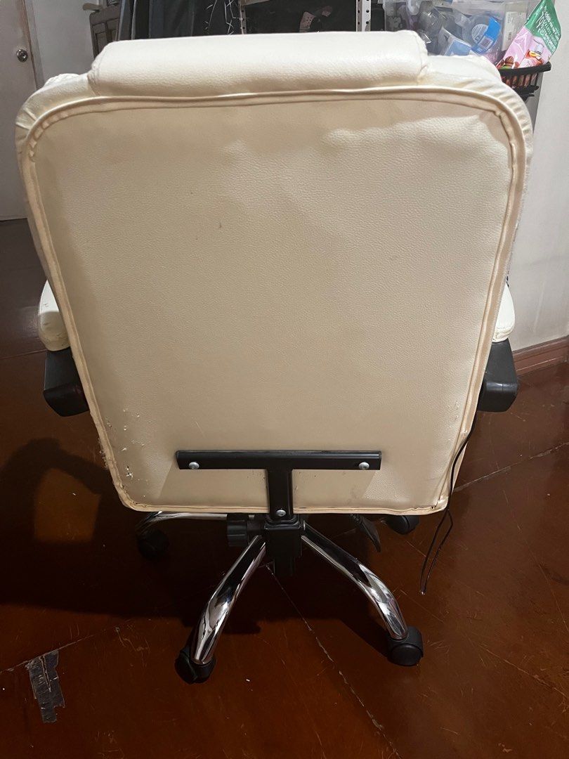 White Office Chair with Footrest (Category: Office Furniture & Fixtures) located in Quezon City. Submitted by kjp78 (Listing ID 1405373014, Image 2). Description: - White office chair - Built-in footrest - Armrests has slight defect - high back for support - Chrome base with wheels - Padded seat and backrest - wear and tear on the back by our cat - For pick-up only.