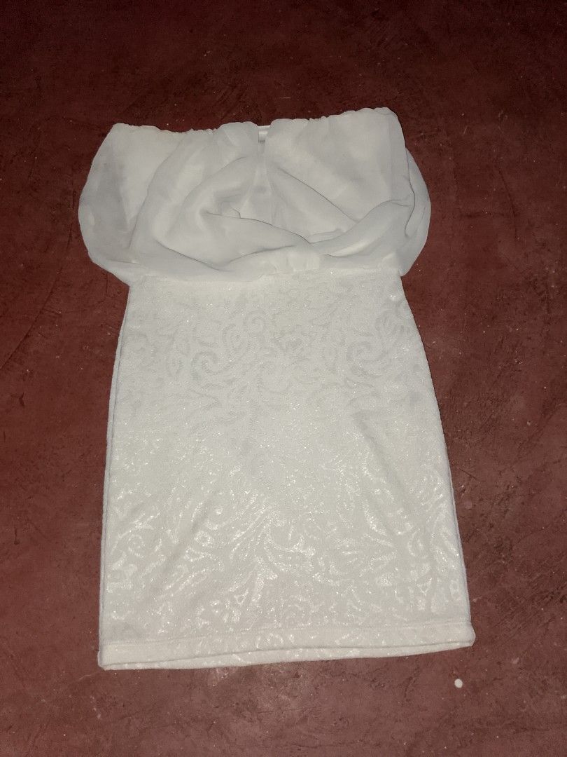 White mini Tube Dress (Category: Dresses) located in Marikina City. Submitted by lemonpreluvs (Listing ID 1405370534, Image 2). Description: - White tube dress - Fitted silhouette - Unique overlay detail - Soft, stretchy fabric - Knee-length hemline - Subtle pattern for reference po I'm the one on the pic I'm size small and it's kinda tight on me actual Dimensions chest- 36 cm hips-36 cm Length- 63 cm.