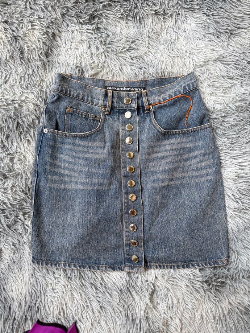 Alexander Wang Denim Skirt (Category: Skirts) located in Legazpi City. Submitted by tiny0509 (Listing ID 1405595819, Image 1). Description: - Authentic Alexander Wang denim skirt - Size: M - Classic denim wash - Button-down front - Two front pockets - Two back pockets - Material: 100% cotton.
