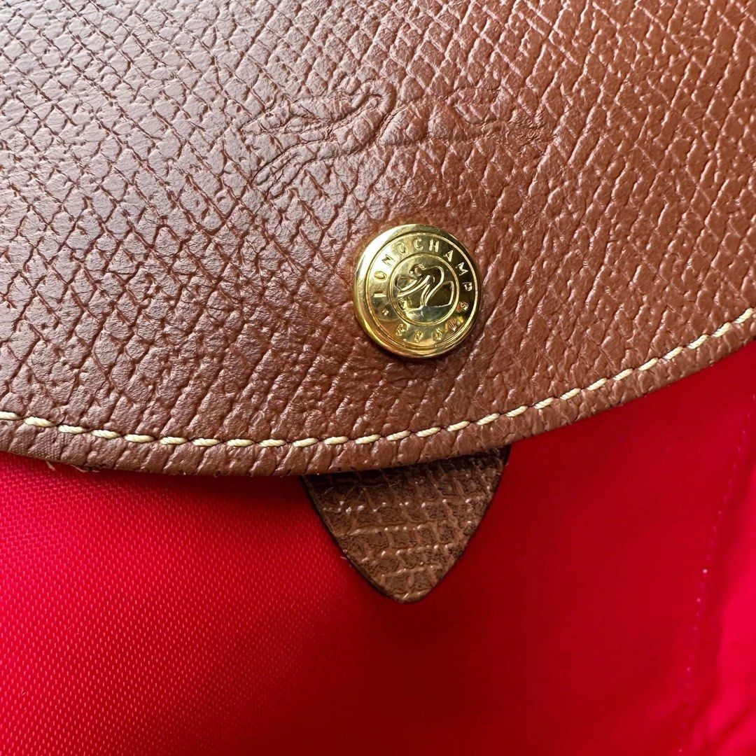 AUTHENTIC❗️Le Pliage Original Backpack M Bag (Category: Luxury Bags & Wallets) located in Caloocan City. Submitted by shopaholicatheart (Listing ID 1405563372, Image 3). Description: 🔖 GUARANTEED AUTHENTIC! 10/10 Rate! 🔖 Valued at 12,920! SELLING LOW! steal price! 😍 🔖 Dimensions : 26 cm (L - measured at the base of the bag) x 28 cm (H) x 10 cm (W) 🔖 Material : Polyamide fabric with a minimum of 70% recycled fibers, with interior coating NO F