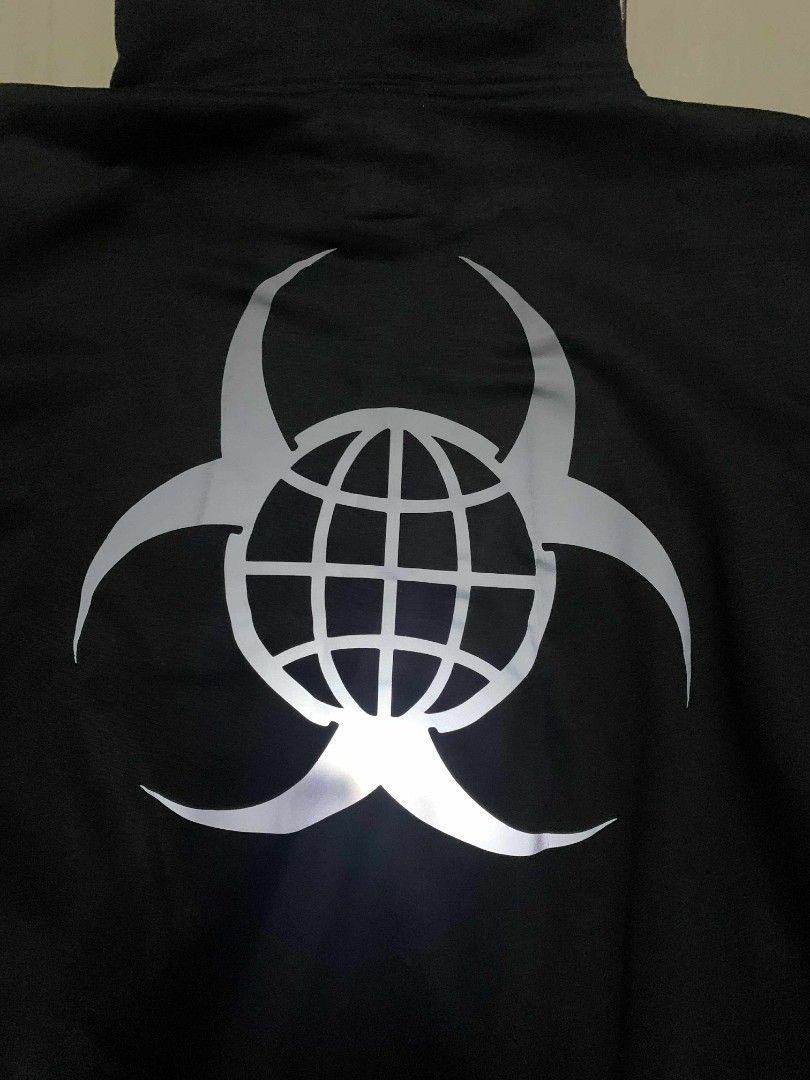 Black Hoodie with Reflective Graphic (Category: Hoodies) located in Manila. Submitted by bitchasssmatfhafucka (Listing ID 1405702081, Image 2). Description: - Black hoodie - Reflective globe graphic with biohazard symbol on the back - Hooded and long-sleeved - Medium-weight fabric - Suitable for cooler weather - Simple and modern design - Versatile for casual wear.