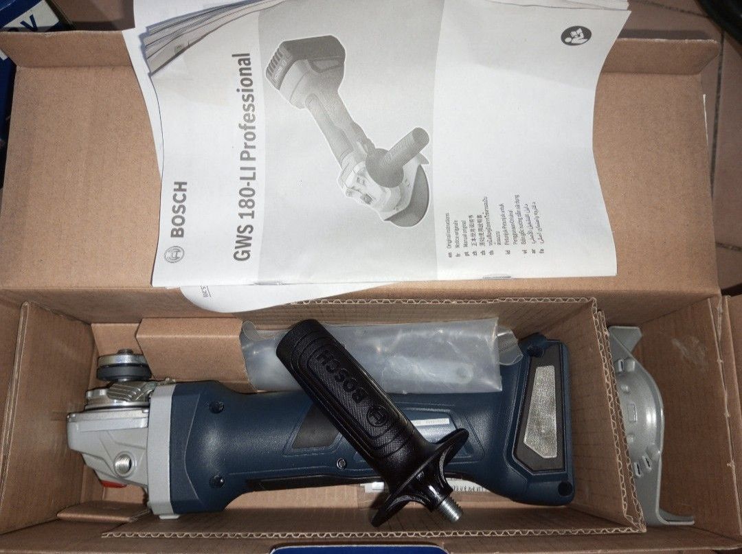 Bosch GWS 180-LI Cordless Angle Grinder (Category: Construction Tools & Equipment) located in Manila. Submitted by captainkenneth (Listing ID 1405709586, Image 2). Description: Bosch GWS 180-LI Professional cordless angle grinder. The box includes the grinder, an auxiliary handle, and a manual. It is an 18V angle grinder. Battery and charger are sold separately. The grinder has a soft start and a brushless motor. It is designed for up to 800W pow