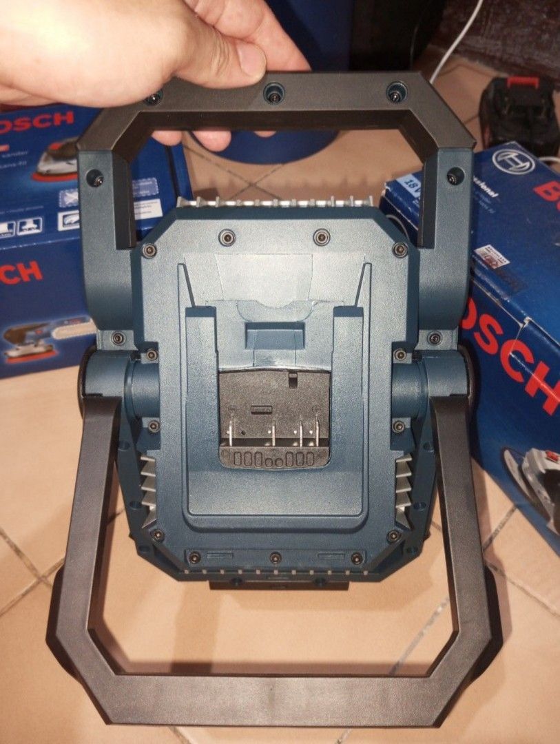 Bosch Professional GLI 18V-1900 LED Work Light (Category: Home Improvement Tools & Accessories) located in Manila. Submitted by captainkenneth (Listing ID 1405709530, Image 3). Description: Bosch Professional GLI 18V-1900 LED work light. Features a bright LED lamp. The work light is designed for professional use. It is compatible with 18V batteries. The images show the work light and its packaging. The work light has a handle for easy carrying..