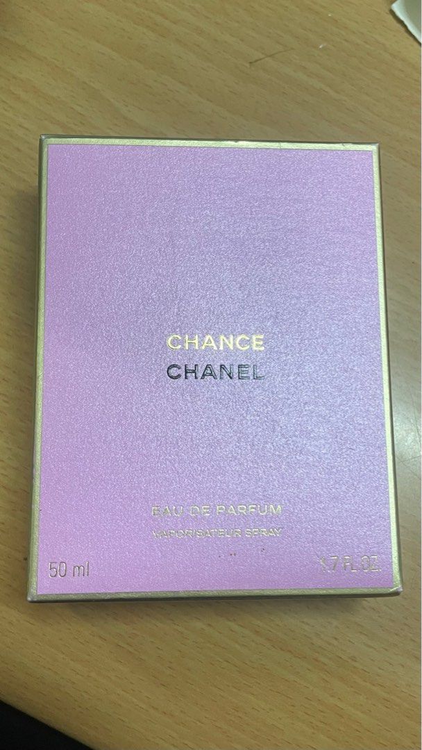 Chanel Chance Eau de Parfum 50ml (Open Seal) (Category: Fragrance & Deodorants) located in Manila. Submitted by Lorebie (Listing ID 1405634142, Image 1). Description: - Chanel Chance Eau de Parfum - 50ml bottle - Sealed box - Light purple box with gold lettering - Vaporisateur spray.