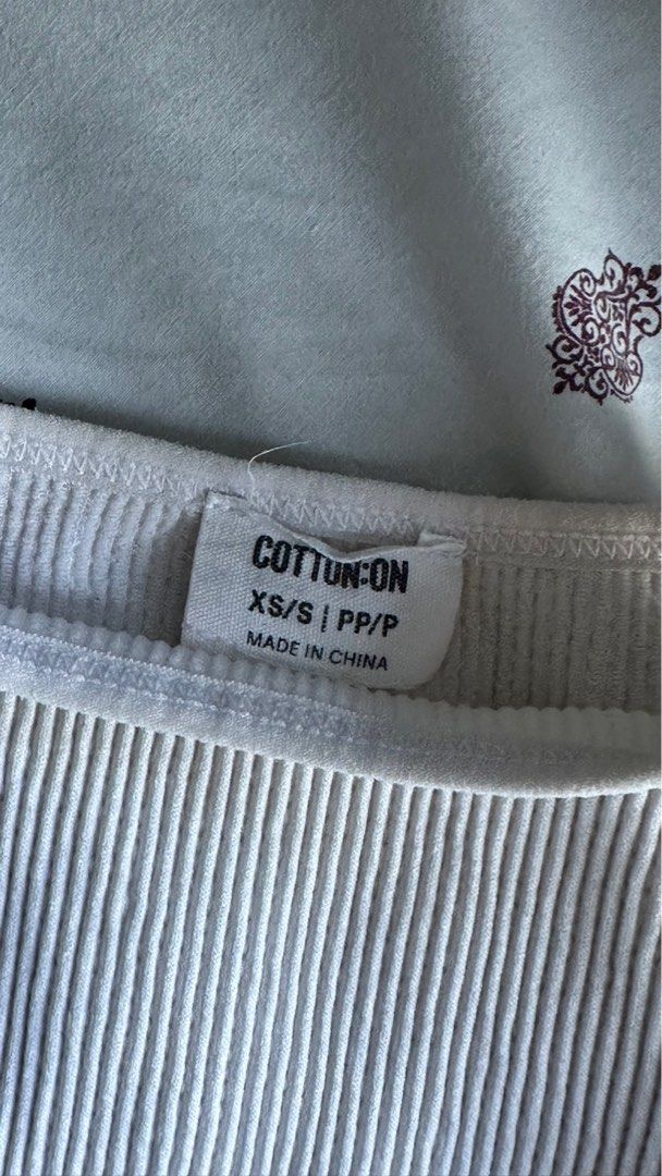 Cotton On Ribbed Crop Top XS (Category: Shirts) located in Quezon City. Submitted by mkme2003 (Listing ID 1405555106, Image 2). Description: Cotton On white ribbed crop top. Size XS. Scoop neck, sleeveless. Great for layering!.