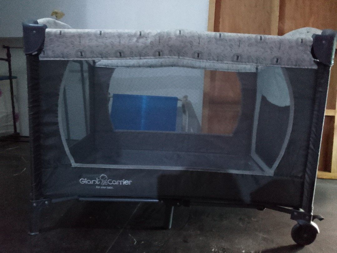 Giant Carrier Playpen (Category: Cots & Cribs) located in Quezon City. Submitted by vanlacsa (Listing ID 1405630958, Image 1). Description: - Giant Carrier playpen - Mesh design for visibility and ventilation - Comes with a carrying bag for easy storage and transport - Provides a safe and comfortable space for your baby di na nagagamit, nakatambak nalng no issue. ayaw na ni baby SA crib.