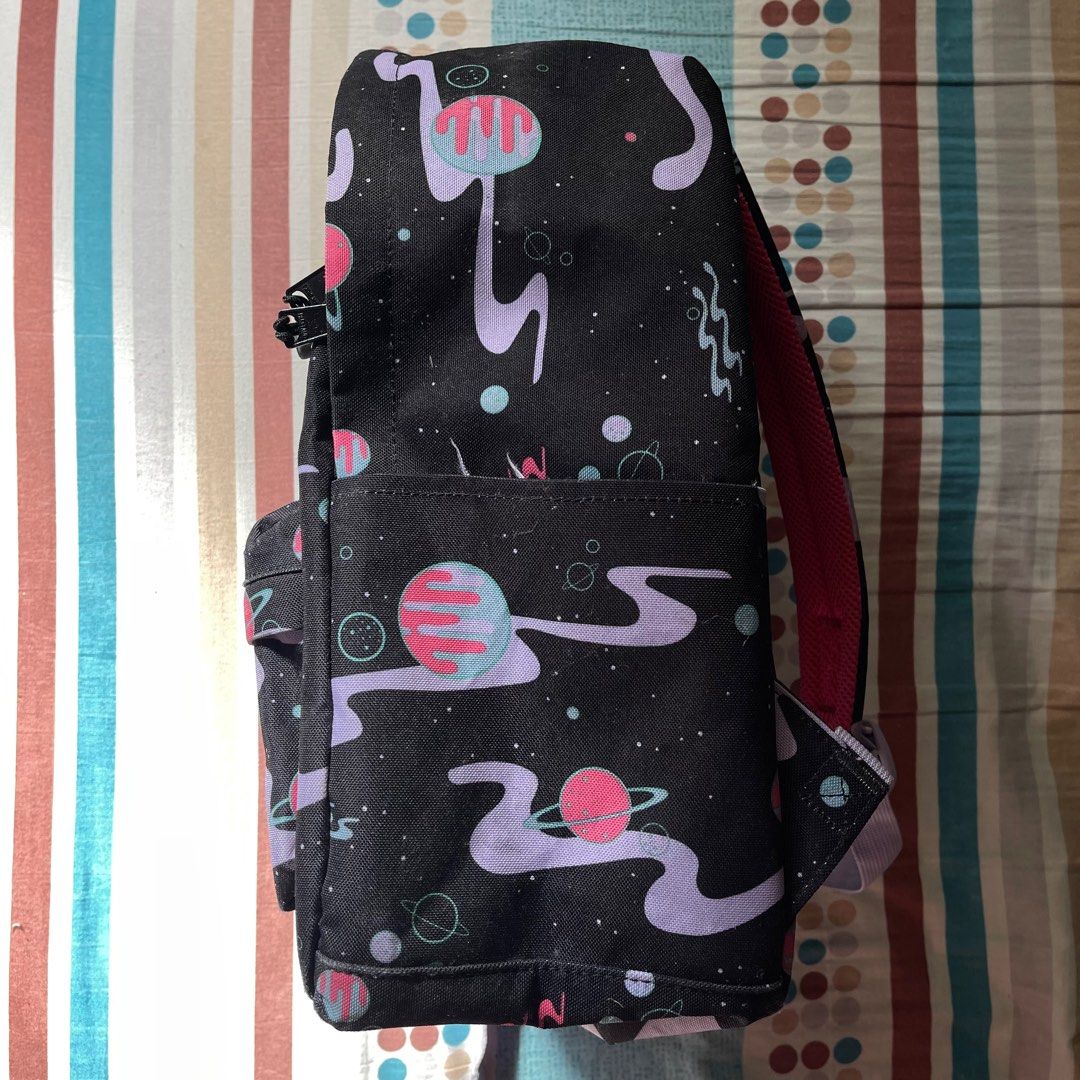 Herschel Supply Co. Backpack - Space Print (Category: Backpacks) located in Manila. Submitted by deymdaniel (Listing ID 1405634201, Image 3). Description: - Herschel Supply Co. backpack with a unique space print. - Features a main compartment, front pocket, and two side pockets. - Adjustable straps for a comfortable fit. - Ideal for school or everyday use..