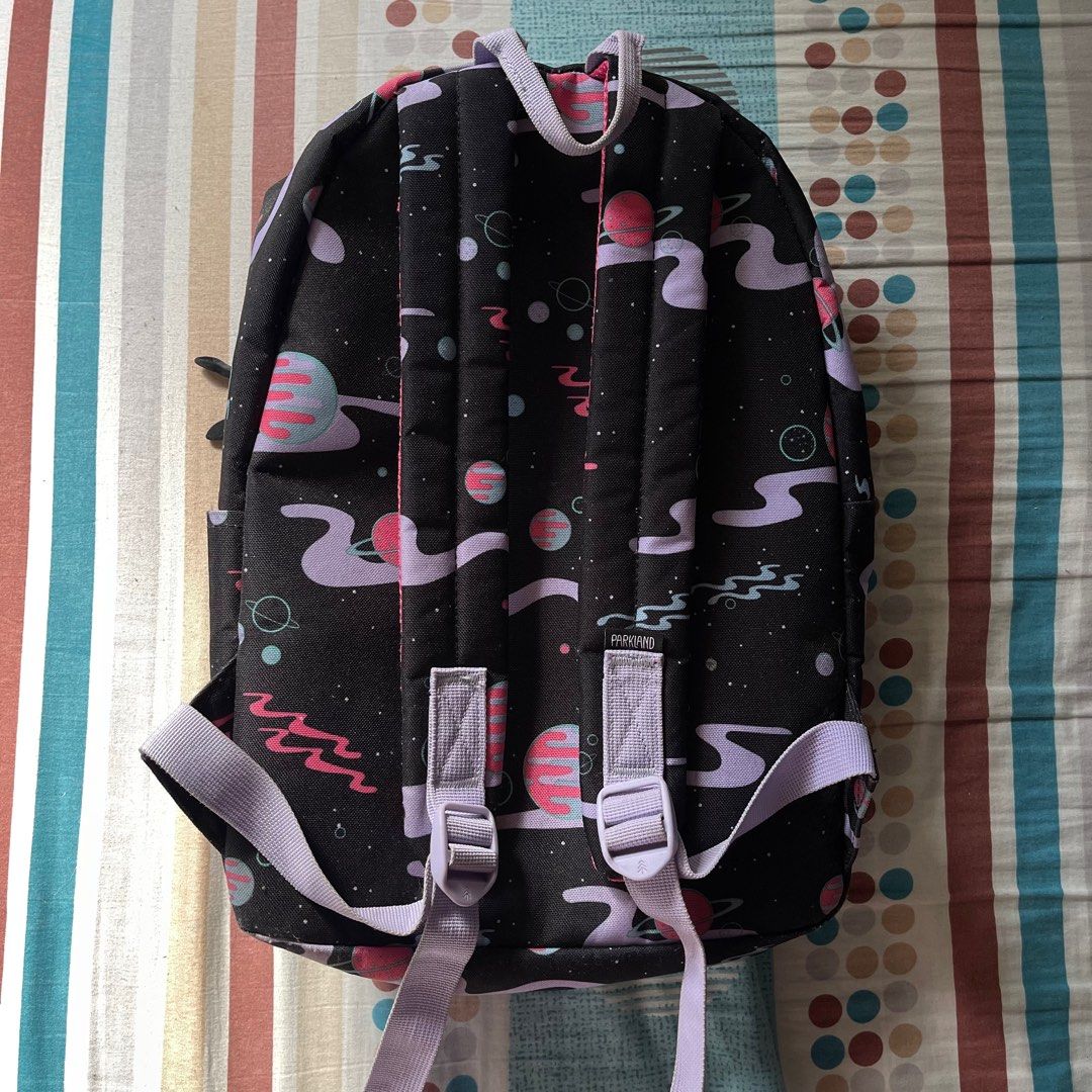 Herschel Supply Co. Backpack - Space Print (Category: Backpacks) located in Manila. Submitted by deymdaniel (Listing ID 1405634201, Image 2). Description: - Herschel Supply Co. backpack with a unique space print. - Features a main compartment, front pocket, and two side pockets. - Adjustable straps for a comfortable fit. - Ideal for school or everyday use..