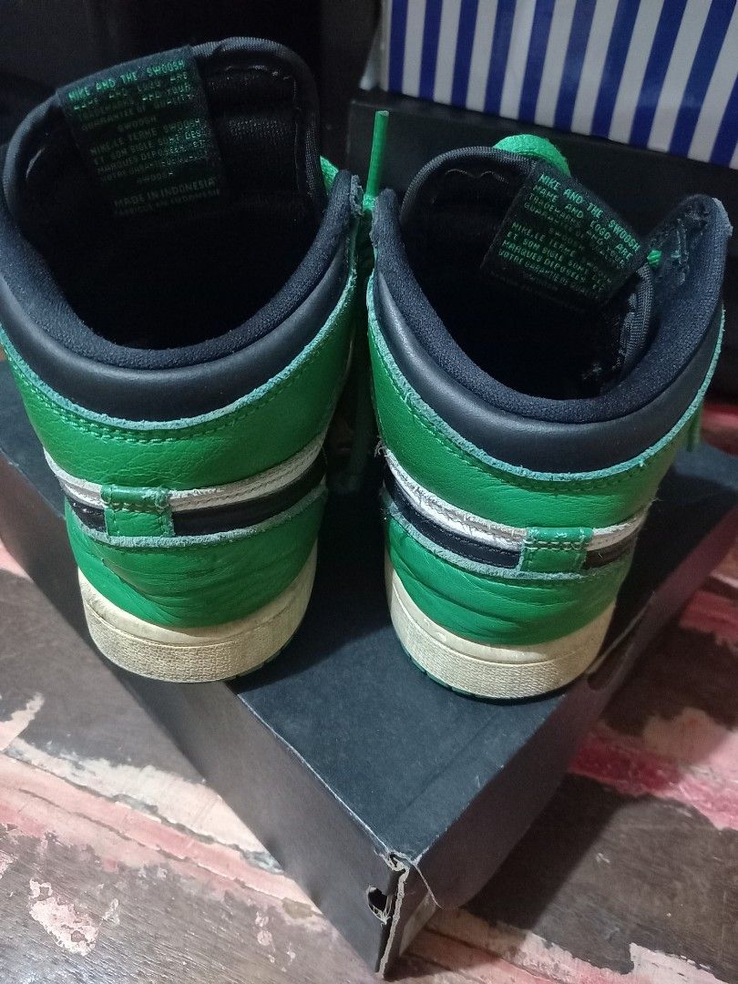 Jordan 1 Retro High OG (PS) Black/Green (Category: Babies & Kids Fashion) located in Manila. Submitted by reginejamito (Listing ID 1405644910, Image 3). Description: - Jordan 1 Retro High OG (PS) sneakers - Size: 2Y - Color: Black, white, and green - Features green laces and black Nike swoosh - Includes original box - Black and green color scheme with white accents Need lang hugasan kasi nakatambak nalang..
