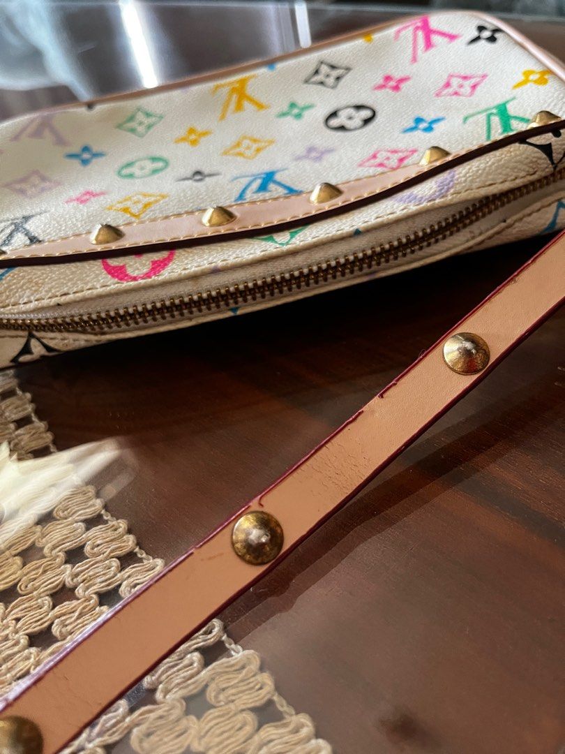 Louis Vuitton multicolored shoulder bag pochette (Category: Luxury Bags & Wallets) located in Manila. Submitted by shopthevintage (Listing ID 1405569848, Image 2). Description: heavily damaged on the inside /last slide (needs to be restored).