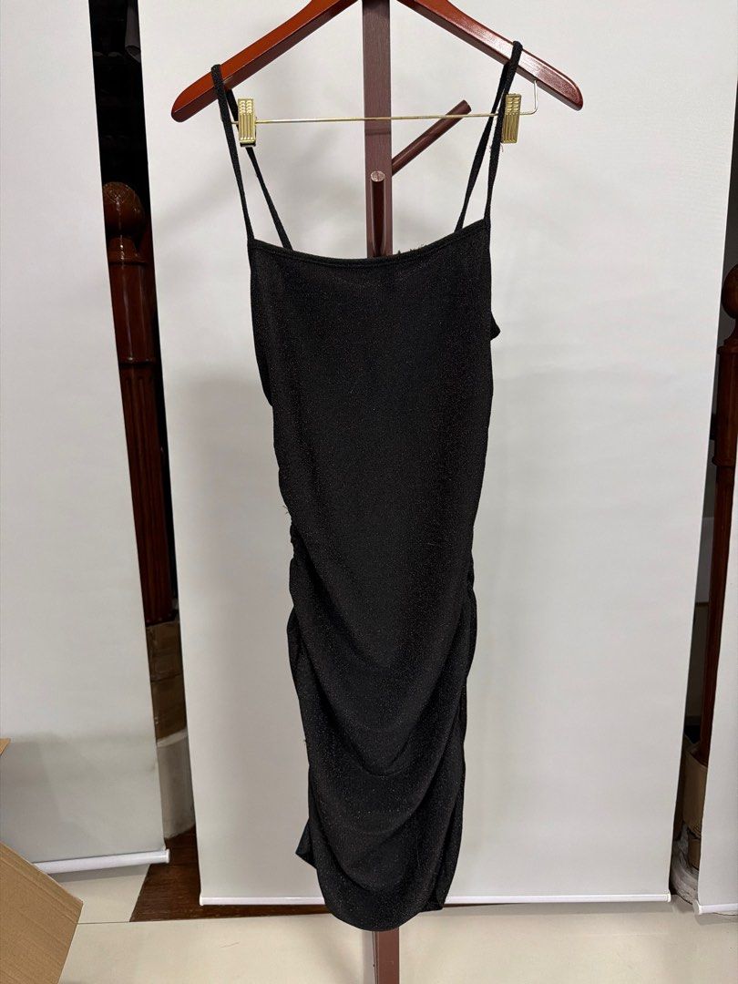 Lovito Black Bodycon Dress (Category: Dresses) located in San Juan City. Submitted by bokisy (Listing ID 1405667111, Image 1). Description: - Lovito black bodycon dress - Size: L (US 8) - Features: Spaghetti straps, ruched design - Color: Black - Made in China - Perfect for various occasions.