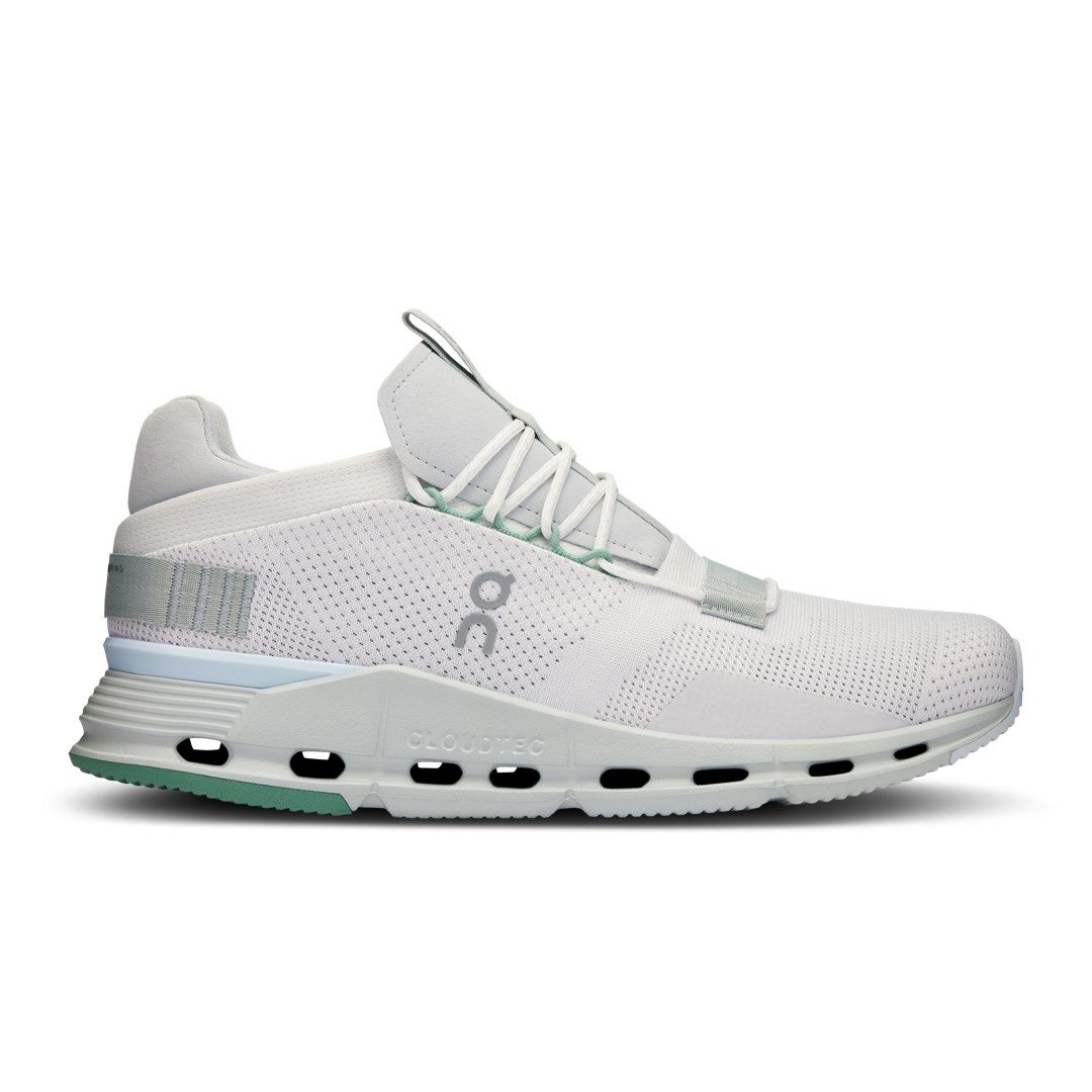 On Cloudnova Undyed Glacier (Category: Sneakers) located in Imus. Submitted by samx_x (Listing ID 1405641721, Image 1). Description: - White On CloudTec sneakers - Breathable upper - Unique lacing system - Distinctive sole design with visible cushioning - Minimalist design - Subtle branding - Primarily white color with mint green accents.