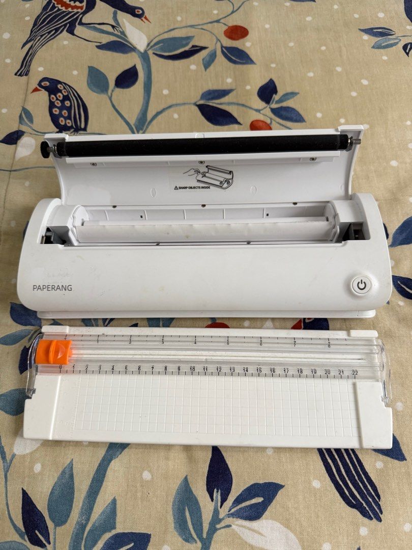 Paperang Label Printer and Paper Cutter (Category: Printers, Scanners & Copiers) located in San Pedro. Submitted by dhaest (Listing ID 1405530164, Image 2). Description: Portable A4 Thermal printer With 1 roll of thernal paper With paper cutter Loc: san pedro, laguna Rfs: upgrading last price na po..