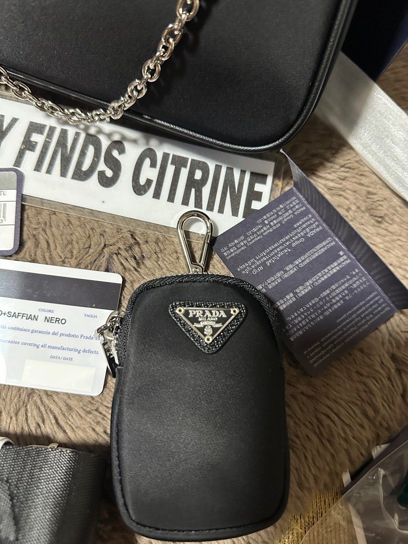 🇯🇵Prada Re-edition 2005 (Category: Luxury Bags & Wallets) located in Manila. Submitted by trendyfindscitrine (Listing ID 1405622339, Image 3). Description: Actual photo posted Made in Italy Comes with original box Materials canvass and Saffiano leather What you see is what you get .