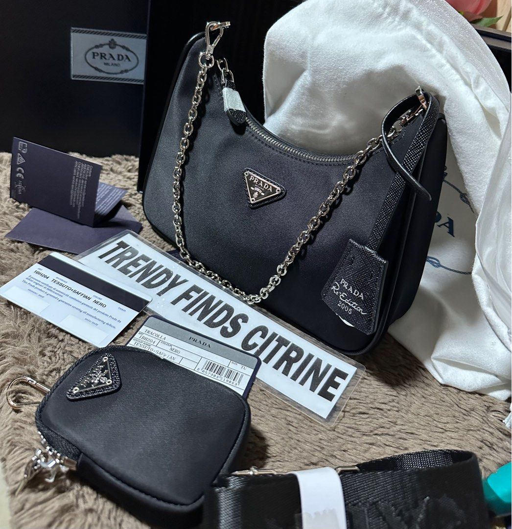 🇯🇵Prada Re-edition 2005 (Category: Luxury Bags & Wallets) located in Manila. Submitted by trendyfindscitrine (Listing ID 1405622339, Image 1). Description: Actual photo posted Made in Italy Comes with original box Materials canvass and Saffiano leather What you see is what you get .