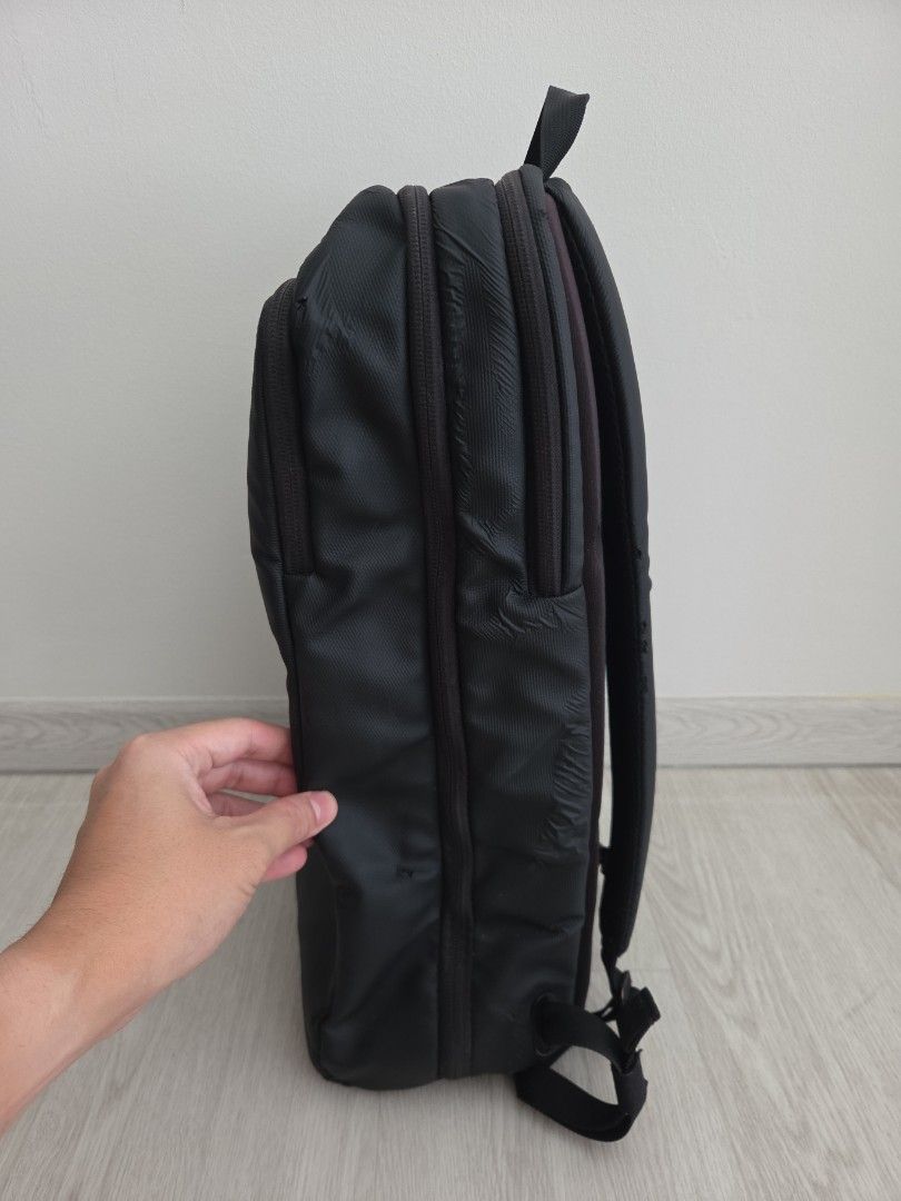 Rapha backpack (Category: Backpacks) located in Singapore. Submitted by damiankoh (Listing ID 1405566462, Image 2). Description: - Stylish black backpack - Multiple compartments for organised storage; zips all working - Padded shoulder straps for comfort - Suitable for work, school, and travel - Measures 40 x 28 x 12cm - Fits a 14-in laptop comfortably - Signs of wear, but still fully functional.