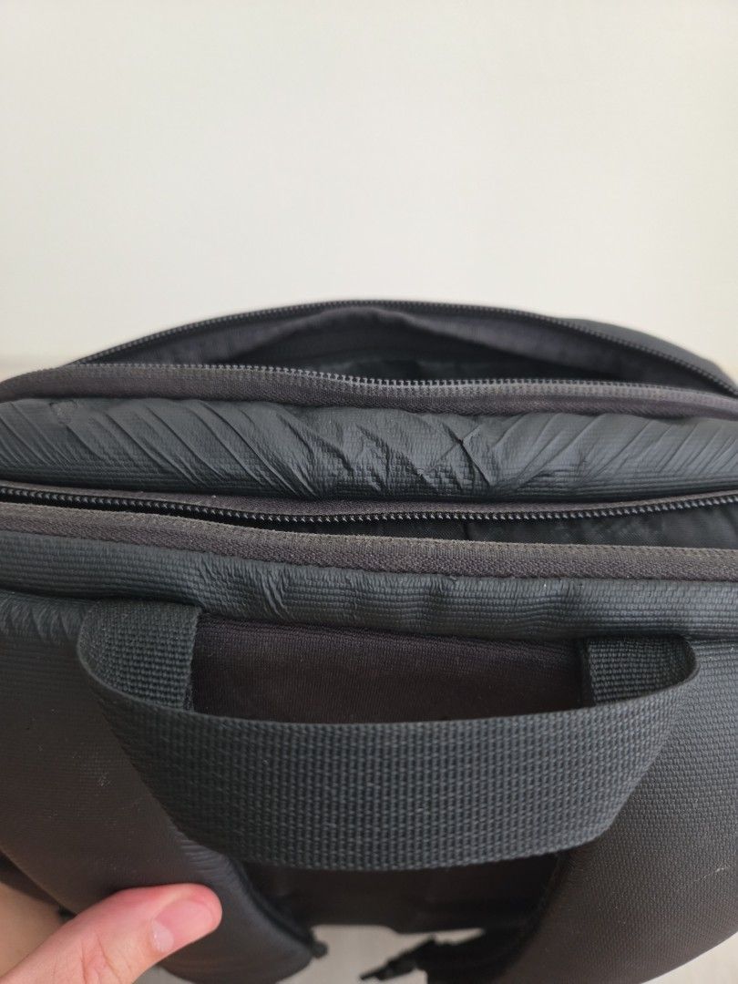 Rapha backpack (Category: Backpacks) located in Singapore. Submitted by dkjc81 (Listing ID 1405566462, Image 7). Description: - Stylish black backpack - Multiple compartments for organised storage; zips all working - Padded shoulder straps for comfort - Suitable for work, school, and travel - Measures 40 x 28 x 12cm - Fits a 14-in laptop comfortably - Signs of wear, but still fully functional.