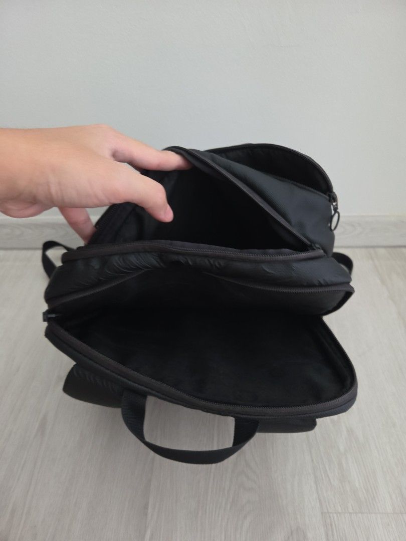 Rapha backpack (Category: Backpacks) located in Singapore. Submitted by dkjc81 (Listing ID 1405566462, Image 6). Description: - Stylish black backpack - Multiple compartments for organised storage; zips all working - Padded shoulder straps for comfort - Suitable for work, school, and travel - Measures 40 x 28 x 12cm - Fits a 14-in laptop comfortably - Signs of wear, but still fully functional.