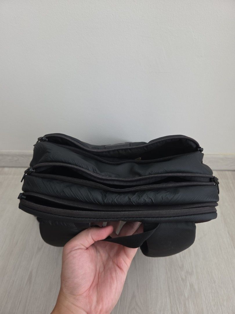 Rapha backpack (Category: Backpacks) located in Singapore. Submitted by dkjc81 (Listing ID 1405566462, Image 4). Description: - Stylish black backpack - Multiple compartments for organised storage; zips all working - Padded shoulder straps for comfort - Suitable for work, school, and travel - Measures 40 x 28 x 12cm - Fits a 14-in laptop comfortably - Signs of wear, but still fully functional.