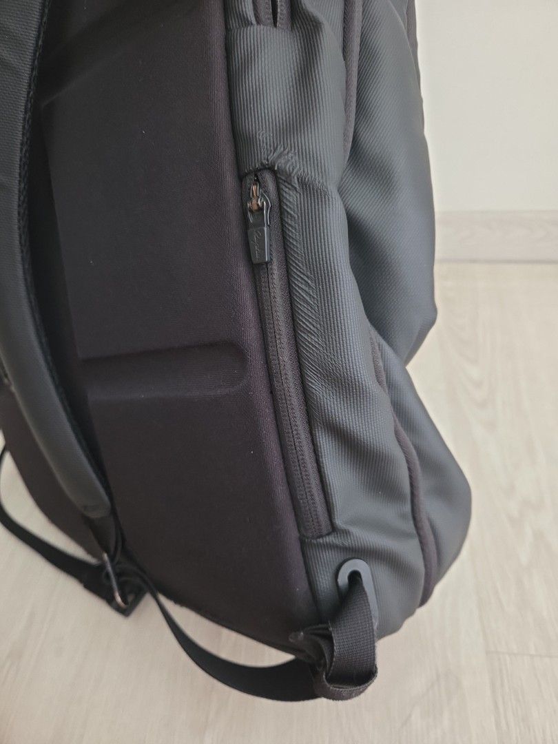 Rapha backpack (Category: Backpacks) located in Singapore. Submitted by dkjc81 (Listing ID 1405566462, Image 9). Description: - Stylish black backpack - Multiple compartments for organised storage; zips all working - Padded shoulder straps for comfort - Suitable for work, school, and travel - Measures 40 x 28 x 12cm - Fits a 14-in laptop comfortably - Signs of wear, but still fully functional.