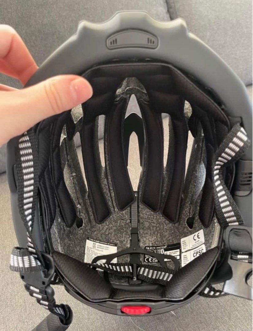 Sena Cycling Helmet (Category: Bicycles) located in Quezon City. Submitted by tat.ph.12 (Listing ID 1405553106, Image 3). Description: - Sena cycling helmet - Black color - Size S (50-55cm) - Adjustable straps - Internal padding - Dial adjustment system - Multiple vents for airflow - Sena logo visible.