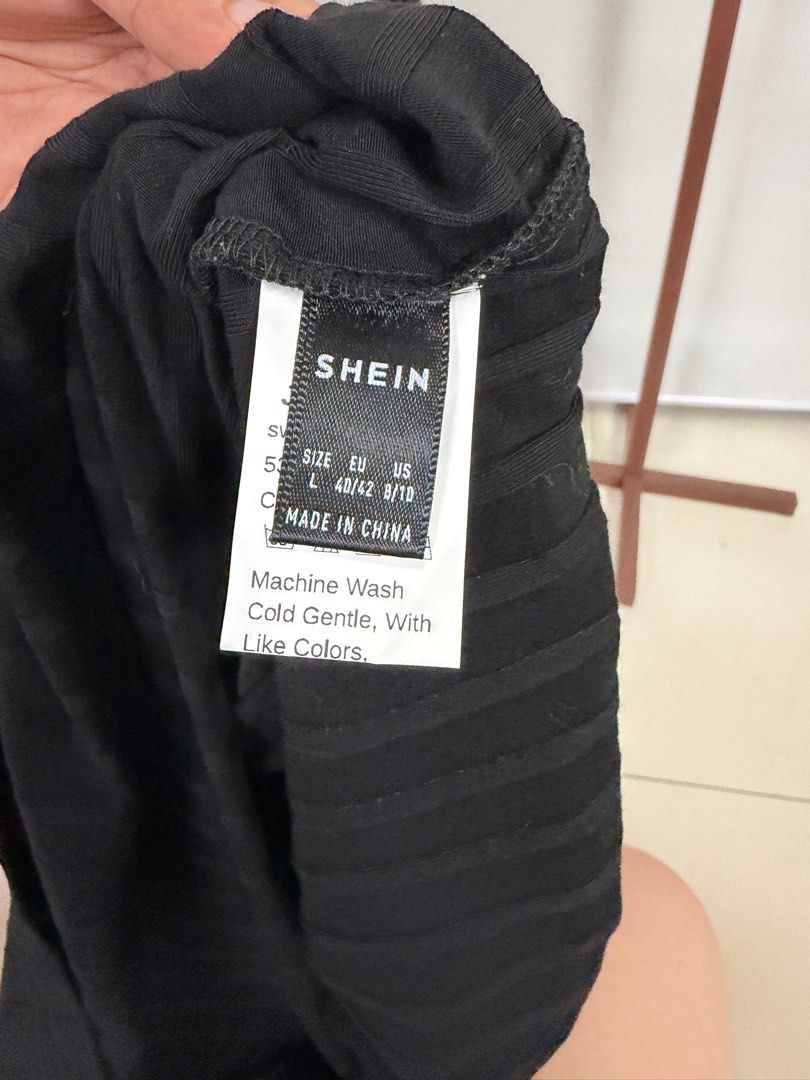 SHEIN Black Ribbed Dress - Large (Category: Dresses) located in San Juan City. Submitted by bokisy (Listing ID 1405664072, Image 2). Description: - SHEIN black dress - Ribbed texture - Mock neck - Short sleeves - Bodycon fit - Size: L (as per tag) - Made in China - Care: Machine wash cold with like colors.