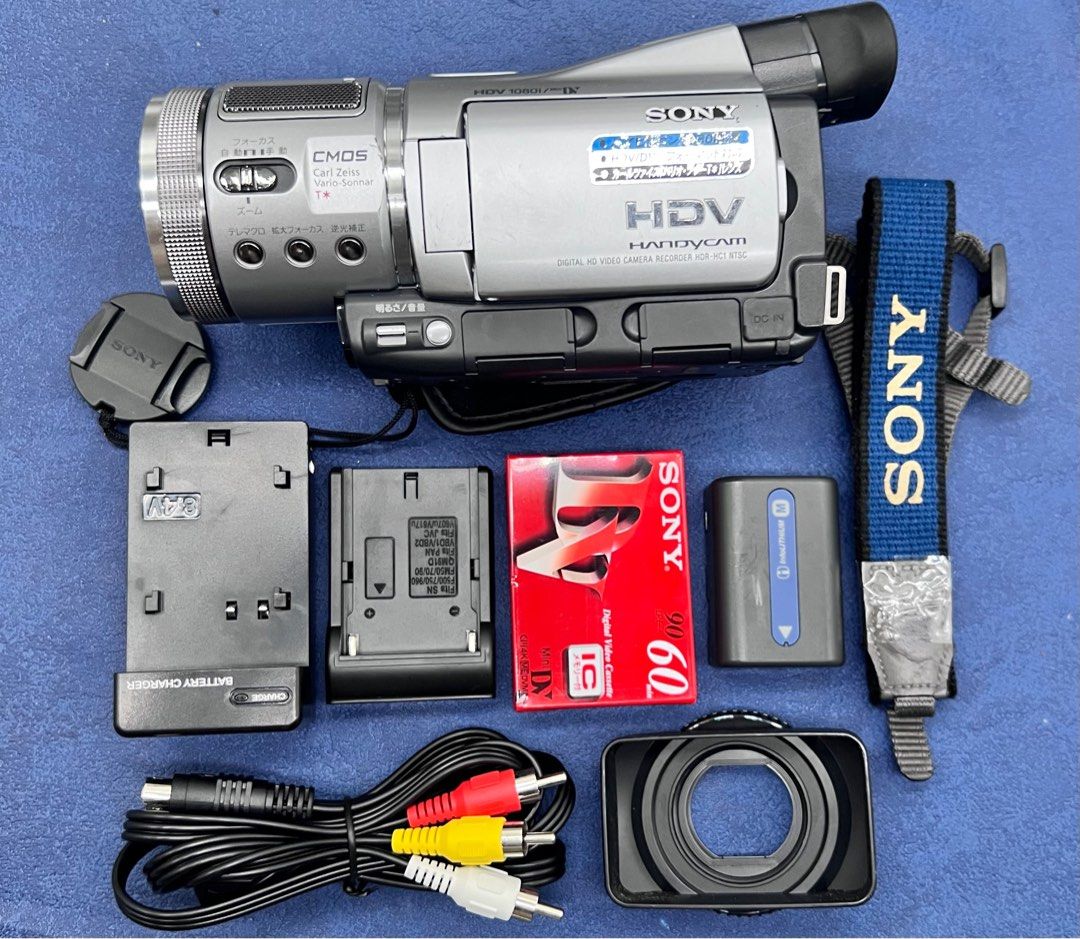 SONY HDV HC1 Mini DV HD Camcorder (RARE) (Category: Video Cameras) located in Makati City. Submitted by maka-luma (Listing ID 1405587032, Image 3). Description: FULLY WORKING ✔️ Record ✔️ Servo Zoom ✔️ Snaps photos with flash ✔️ Rewind ✔️ Fast forward ✔️ Color viewfinder ✔️ Color LCD ✔️ Touch screen ✔️ Memory Card slot ✔️ tape eject ✔️ HD - resolution ✔️ Menu features READY TO USE! 📹📼🔋Inclusions: Camera unit, Lens cap, Lens Matte box, camera s