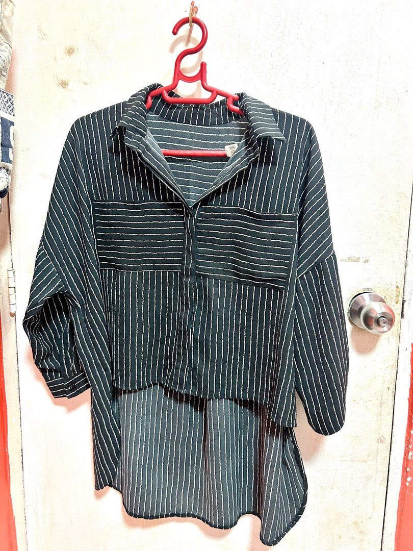 Striped Blouse (Category: Blouses) located in Caloocan City. Submitted by decluttervette (Listing ID 1405565772, Image 1). Description: - Black and white striped blouse - Collared neckline - Button-down front - High-low hem - Three-quarter sleeves - Lightweight fabric.