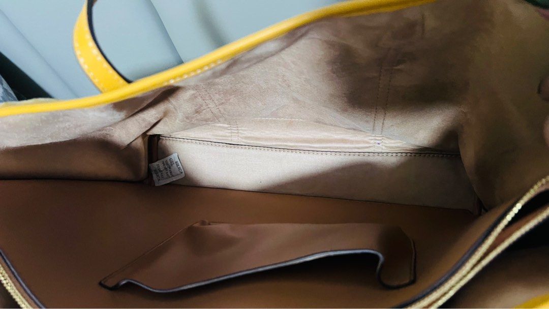 Tory Burch Perry T Monogram Triple-Compartment Tote (Category: Luxury Bags & Wallets) located in Quezon City. Submitted by kishey (Listing ID 1405640139, Image 3). Description: - rub in one corner but very minimal lang • Height: 11.4 inches to 11.5 inches (29.0 cm) • Length: 14.2 inches to 14.3 inches (36.0 cm) • Depth: 5.3 inches (13.4 cm) - Authentic Tory Burch tote bag - Yellow leather trim and handles - Monogram pattern - Interior zippered po