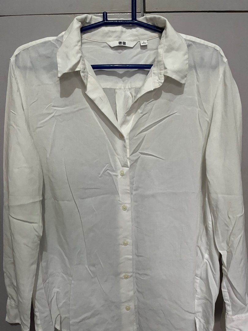 Uniqlo rayon long sleeve blouse (Category: Shirts) located in Batangas. Submitted by _azalea (Listing ID 1405590401, Image 2). Description: - Uniqlo white button-down shirt - Size: S - Perfect for casual and semi-formal occasions ⛔️No rush shipping ⛔️No return/exchange.