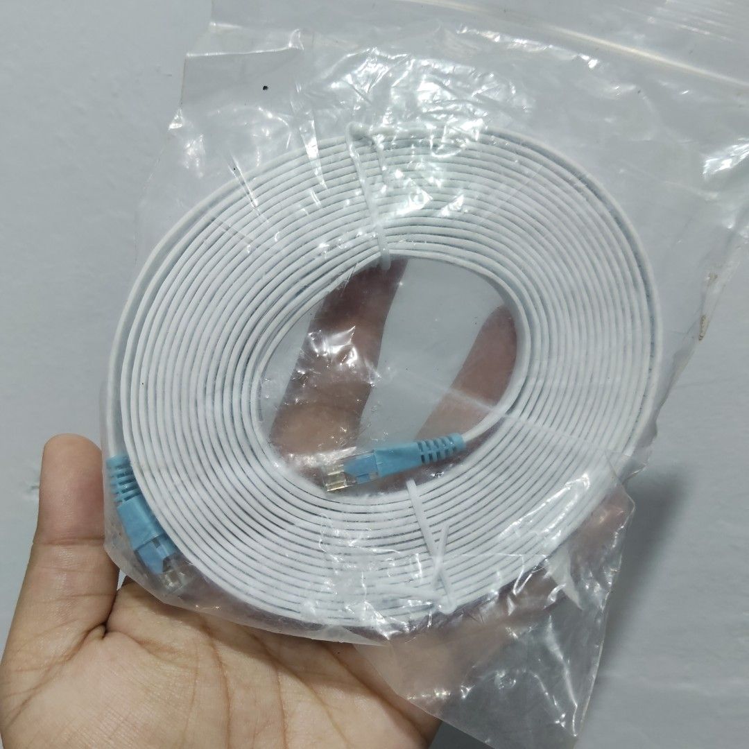 White LAN cable (Category: Cables & Adaptors) located in Catbalogan. Submitted by jpnsrpls (Listing ID 1405673921, Image 2). Description: White LAN cable with cute blue connectors! Perfect for your internet setup at home or in the office. Brand new! 🇵🇭 #LANcable #EthernetCable #TechPH #InternetEssential.