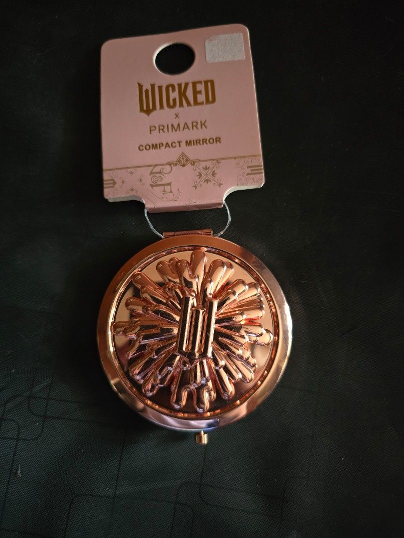 Wicked Compact Mirror (Category: Face Care) located in Marikina City. Submitted by wigglywiggy (Listing ID 1405565487, Image 1). Description: - Primark Wicked compact mirror - Elegant rose gold finish - Intricate exterior design - Contains two mirrors - Brand new with original tag - Ideal for on-the-go touch-ups.